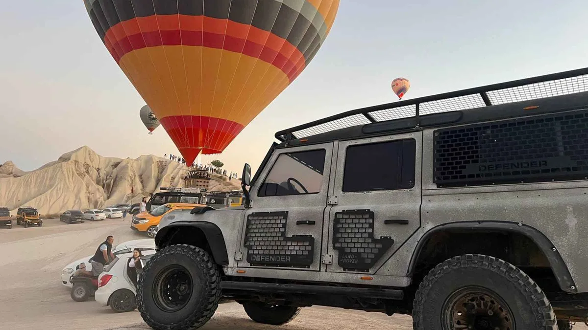 Open-top jeep safari at sunset in the Cappadocia valleys