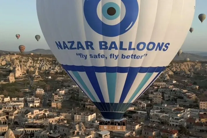 Nazar Balloons canopy at sunrise over the Cappadocia valleys on a hot air balloon flight