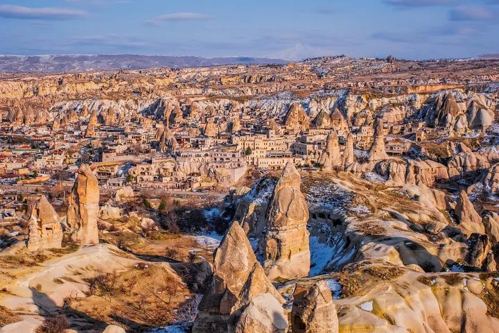Private guided Cappadocia tour car parked at a valley viewpoint